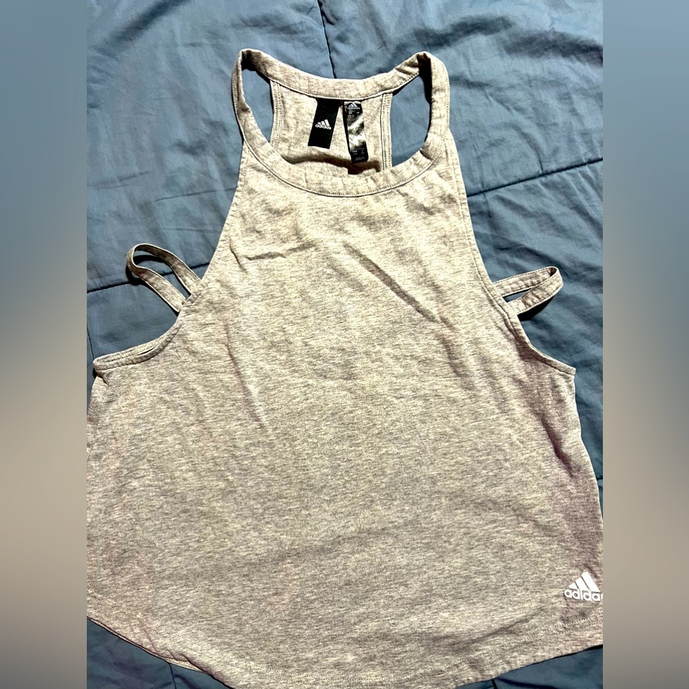 Women’s Adidas Gray Cotton tank with cut out on sides. Runs big. Small.